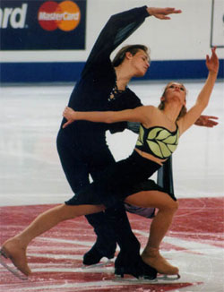 This is an Amy Mossman photo of a man and a woman – in an elegant lunge position. 