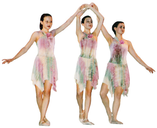 This is the cutout of the three dancers in multi-colored dresses.  The dancer in the middle of the trio has her arms crossed above her head.